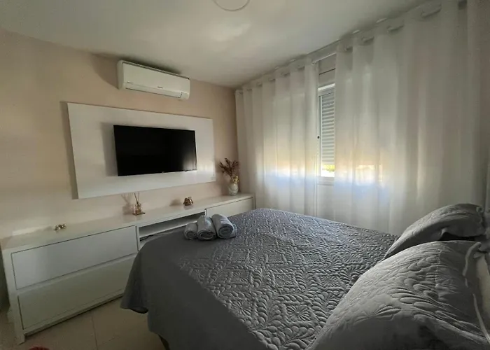 Apartamento suíte com estacionamento